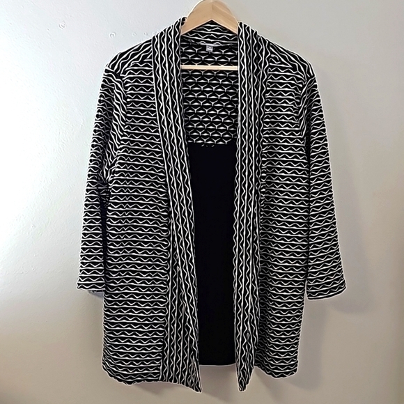 My collection is a woman's 2X black and white classic top. Connected tank. - Picture 1 of 8